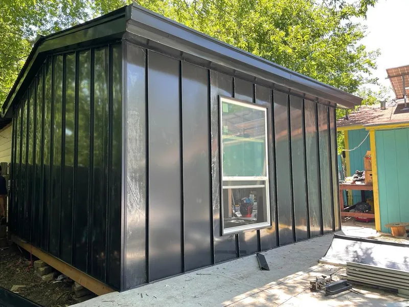 Black standing seam metal wall panels for Metal Roof Installation in Batavia